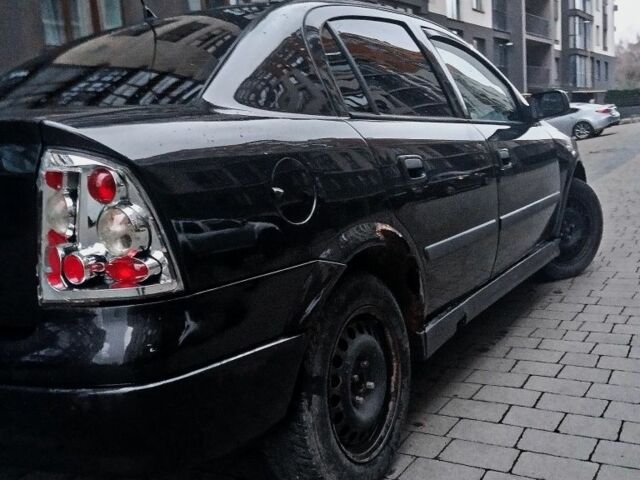 Черный Опель Астра, объемом двигателя 1.4 л и пробегом 214 тыс. км за 1800 $, фото 17 на Automoto.ua