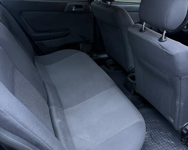 Черный Опель Астра, объемом двигателя 1.36 л и пробегом 260 тыс. км за 2900 $, фото 13 на Automoto.ua