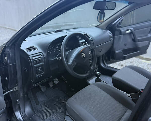 Черный Опель Астра, объемом двигателя 1.36 л и пробегом 260 тыс. км за 2900 $, фото 10 на Automoto.ua