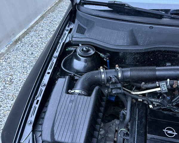 Черный Опель Астра, объемом двигателя 1.36 л и пробегом 260 тыс. км за 2900 $, фото 16 на Automoto.ua