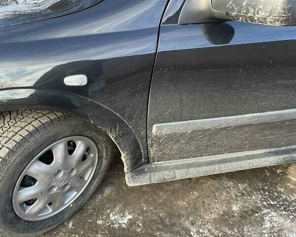 Черный Опель Астра, объемом двигателя 1.39 л и пробегом 280 тыс. км за 3300 $, фото 21 на Automoto.ua