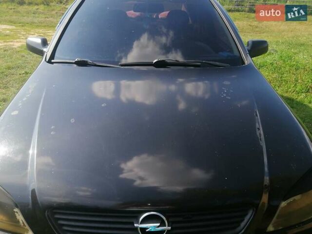 Черный Опель Астра, объемом двигателя 1.4 л и пробегом 250 тыс. км за 3000 $, фото 2 на Automoto.ua