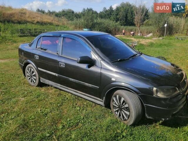 Черный Опель Астра, объемом двигателя 1.4 л и пробегом 250 тыс. км за 3000 $, фото 9 на Automoto.ua