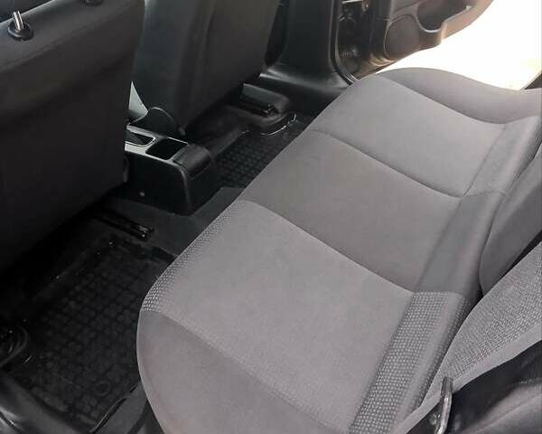 Черный Опель Астра, объемом двигателя 1.39 л и пробегом 214 тыс. км за 1800 $, фото 27 на Automoto.ua