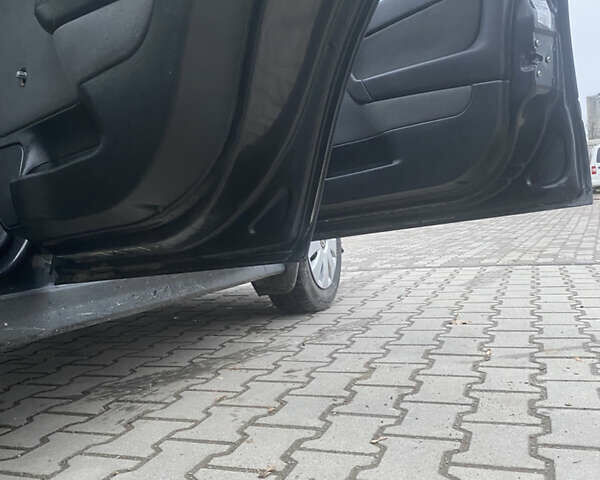 Черный Опель Астра, объемом двигателя 1.4 л и пробегом 229 тыс. км за 3200 $, фото 15 на Automoto.ua