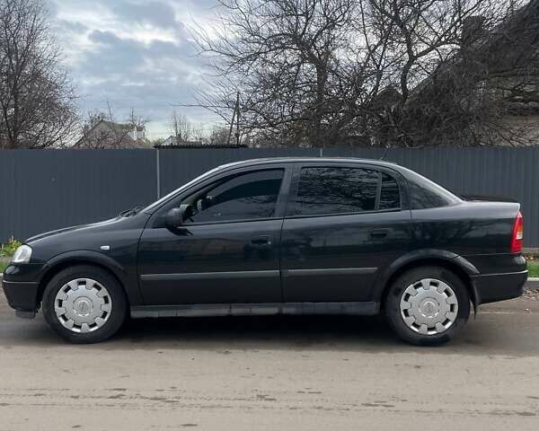 Черный Опель Астра, объемом двигателя 1.36 л и пробегом 135 тыс. км за 3400 $, фото 4 на Automoto.ua