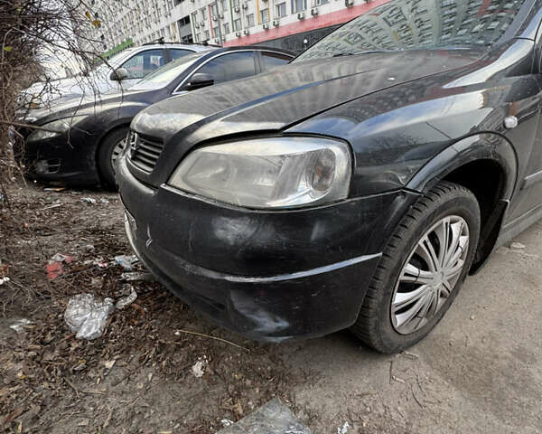 Черный Опель Астра, объемом двигателя 1.4 л и пробегом 225 тыс. км за 2799 $, фото 3 на Automoto.ua