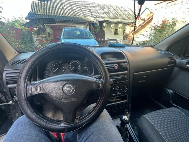 Черный Опель Астра, объемом двигателя 1.6 л и пробегом 151 тыс. км за 3700 $, фото 13 на Automoto.ua