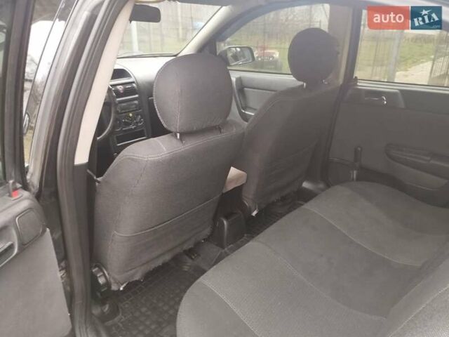 Чорний Опель Астра, об'ємом двигуна 1.4 л та пробігом 250 тис. км за 3999 $, фото 10 на Automoto.ua