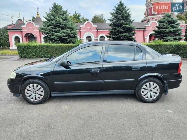 Чорний Опель Астра, об'ємом двигуна 1.6 л та пробігом 203 тис. км за 4700 $, фото 8 на Automoto.ua