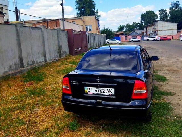 Черный Опель Астра, объемом двигателя 1.4 л и пробегом 141 тыс. км за 4000 $, фото 1 на Automoto.ua
