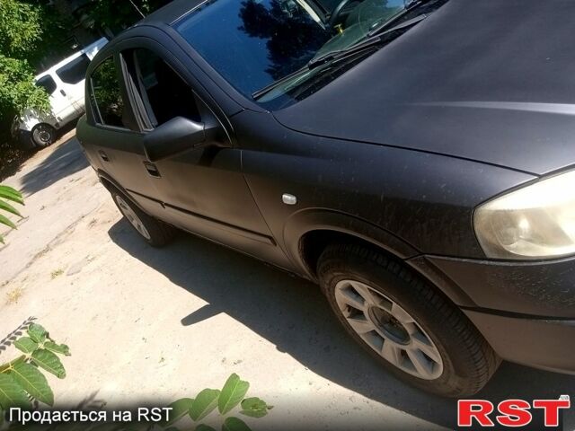 Черный Опель Астра, объемом двигателя 1.4 л и пробегом 100 тыс. км за 3300 $, фото 7 на Automoto.ua