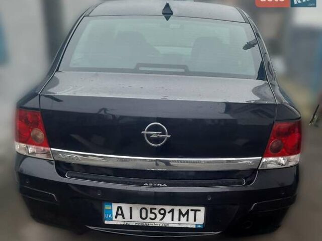 Черный Опель Астра, объемом двигателя 1.6 л и пробегом 180 тыс. км за 3800 $, фото 2 на Automoto.ua