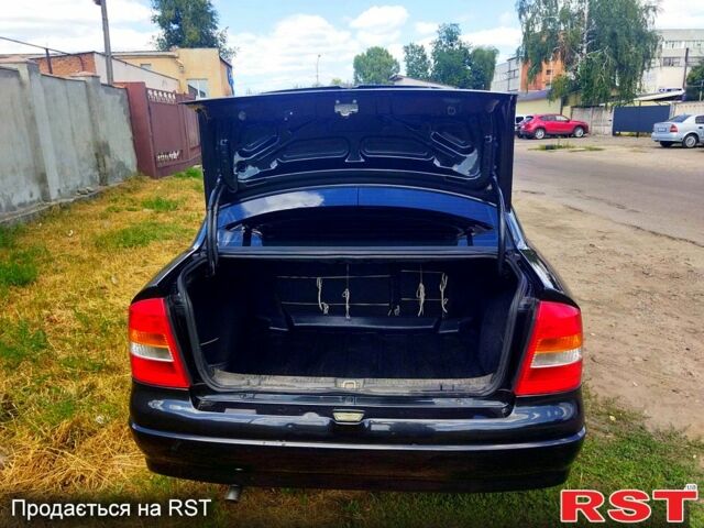 Черный Опель Астра, объемом двигателя 1.4 л и пробегом 141 тыс. км за 4000 $, фото 3 на Automoto.ua