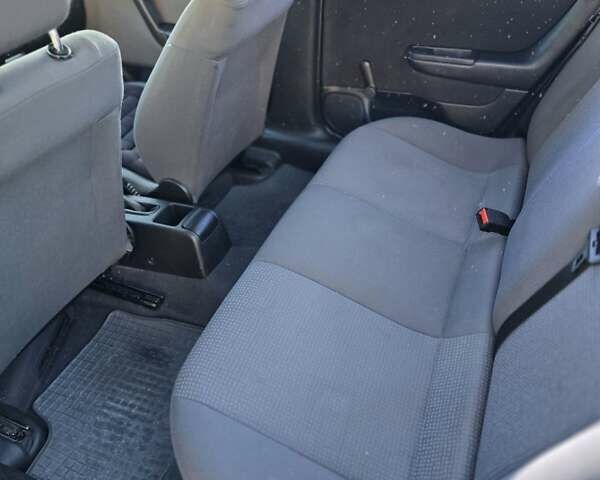 Черный Опель Астра, объемом двигателя 1.6 л и пробегом 217 тыс. км за 3800 $, фото 21 на Automoto.ua
