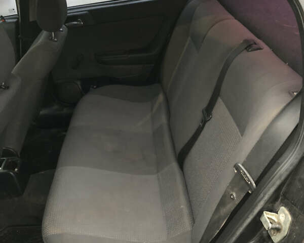 Черный Опель Астра, объемом двигателя 1.36 л и пробегом 292 тыс. км за 2700 $, фото 9 на Automoto.ua