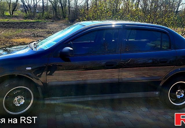 Чорний Опель Астра, об'ємом двигуна 1.6 л та пробігом 260 тис. км за 4150 $, фото 3 на Automoto.ua