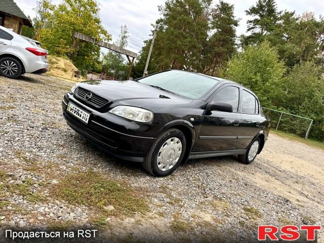 Черный Опель Астра, объемом двигателя 1.4 л и пробегом 176 тыс. км за 4390 $, фото 1 на Automoto.ua