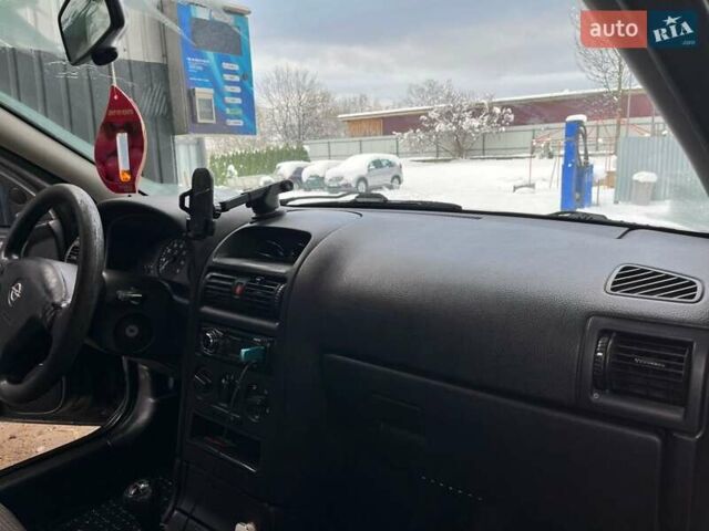 Чорний Опель Астра, об'ємом двигуна 1.39 л та пробігом 170 тис. км за 5100 $, фото 6 на Automoto.ua
