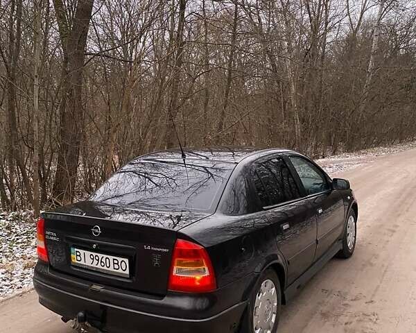 Черный Опель Астра, объемом двигателя 1.4 л и пробегом 160 тыс. км за 3500 $, фото 3 на Automoto.ua
