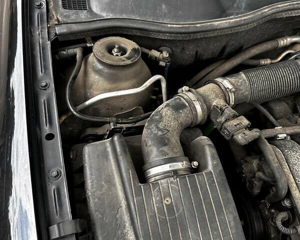 Черный Опель Астра, объемом двигателя 1.4 л и пробегом 277 тыс. км за 3300 $, фото 17 на Automoto.ua