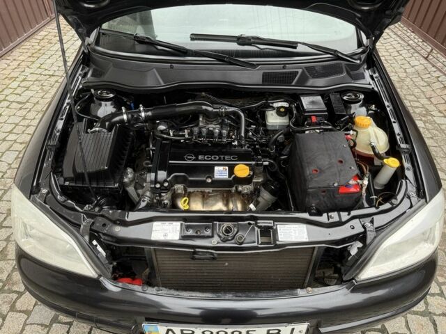 Черный Опель Астра, объемом двигателя 1.4 л и пробегом 160 тыс. км за 4000 $, фото 18 на Automoto.ua