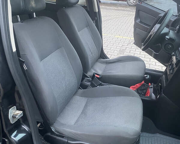 Черный Опель Астра, объемом двигателя 1.4 л и пробегом 229 тыс. км за 3200 $, фото 13 на Automoto.ua