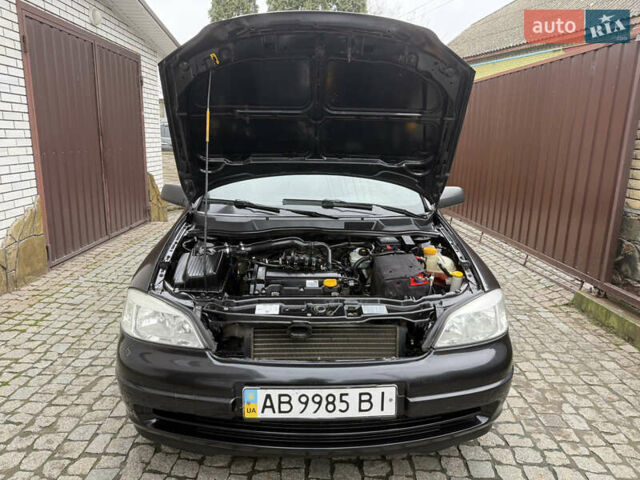 Чорний Опель Астра, об'ємом двигуна 1.4 л та пробігом 160 тис. км за 4000 $, фото 29 на Automoto.ua