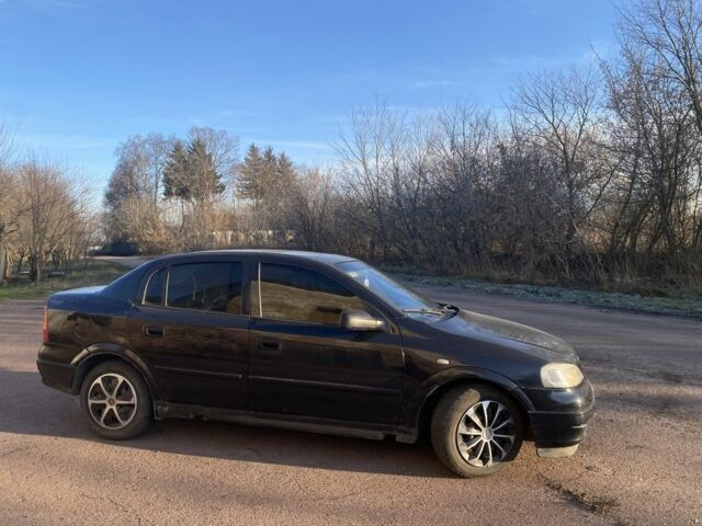 Черный Опель Астра, объемом двигателя 1.4 л и пробегом 219 тыс. км за 3400 $, фото 3 на Automoto.ua