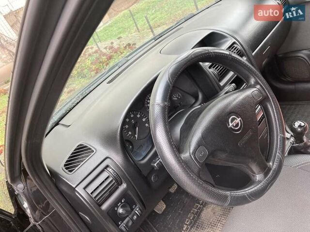 Чорний Опель Астра, об'ємом двигуна 1.4 л та пробігом 97 тис. км за 4800 $, фото 4 на Automoto.ua
