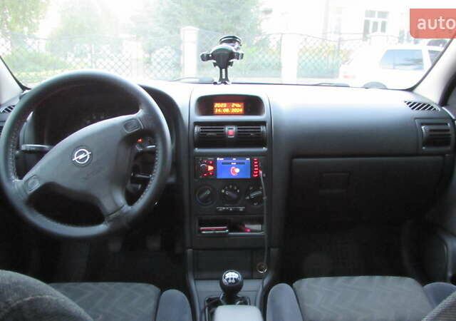 Черный Опель Астра, объемом двигателя 1.4 л и пробегом 277 тыс. км за 3300 $, фото 16 на Automoto.ua