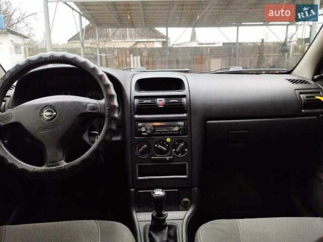 Чорний Опель Астра, об'ємом двигуна 1.4 л та пробігом 250 тис. км за 3999 $, фото 8 на Automoto.ua