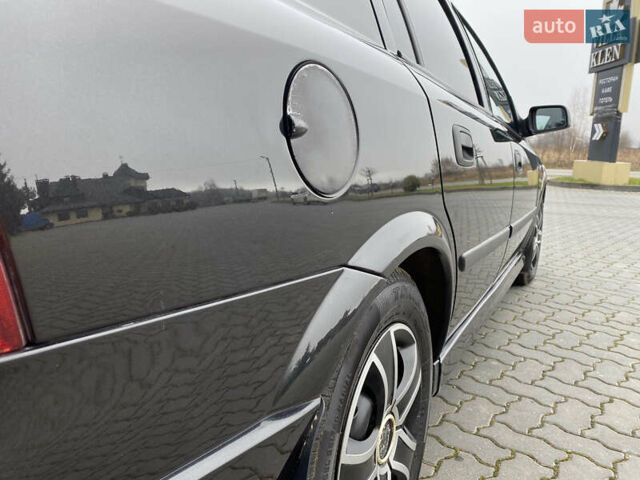 Чорний Опель Астра, об'ємом двигуна 1.36 л та пробігом 198 тис. км за 3950 $, фото 7 на Automoto.ua