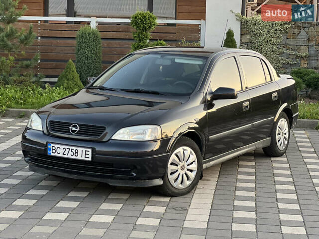 Чорний Опель Астра, об'ємом двигуна 1.6 л та пробігом 214 тис. км за 2999 $, фото 7 на Automoto.ua