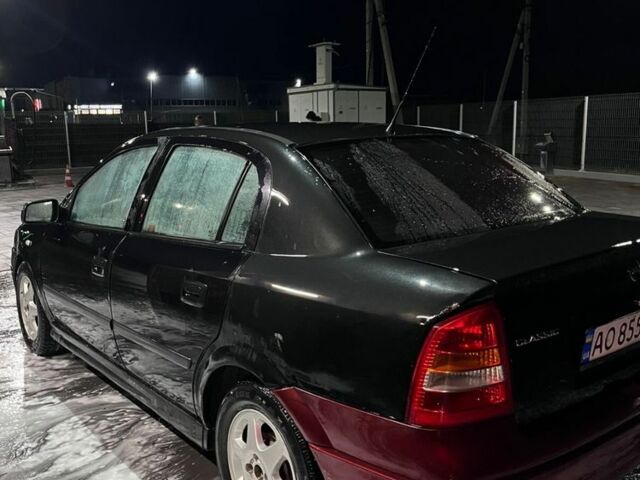 Черный Опель Астра, объемом двигателя 1.4 л и пробегом 338 тыс. км за 2300 $, фото 9 на Automoto.ua