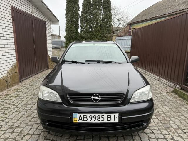 Черный Опель Астра, объемом двигателя 1.4 л и пробегом 160 тыс. км за 4000 $, фото 1 на Automoto.ua