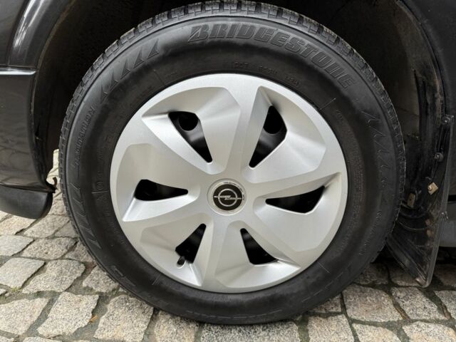 Черный Опель Астра, объемом двигателя 1.4 л и пробегом 160 тыс. км за 4000 $, фото 21 на Automoto.ua