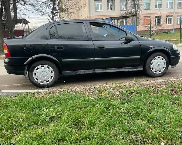 Черный Опель Астра, объемом двигателя 1.36 л и пробегом 135 тыс. км за 3400 $, фото 3 на Automoto.ua