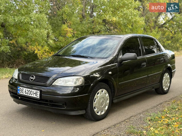 Черный Опель Астра, объемом двигателя 1.4 л и пробегом 250 тыс. км за 3650 $, фото 2 на Automoto.ua