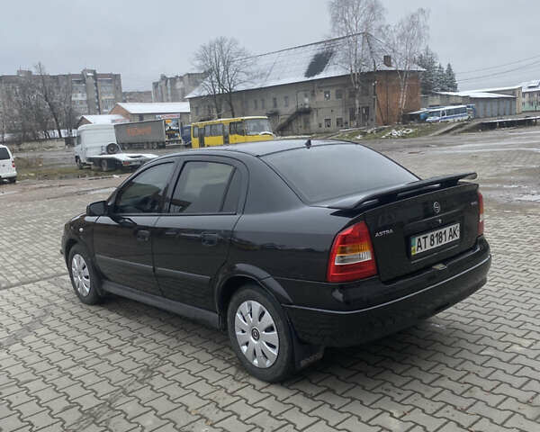 Черный Опель Астра, объемом двигателя 1.4 л и пробегом 229 тыс. км за 3200 $, фото 6 на Automoto.ua