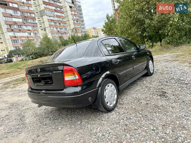 Черный Опель Астра, объемом двигателя 1.4 л и пробегом 176 тыс. км за 4390 $, фото 6 на Automoto.ua