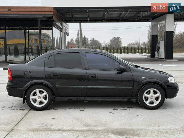 Чорний Опель Астра, об'ємом двигуна 1.6 л та пробігом 212 тис. км за 2999 $, фото 9 на Automoto.ua