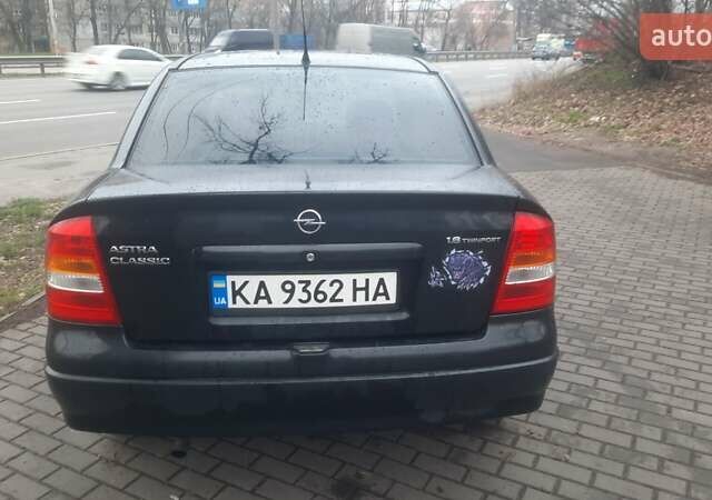 Черный Опель Астра, объемом двигателя 1.6 л и пробегом 277 тыс. км за 3400 $, фото 3 на Automoto.ua