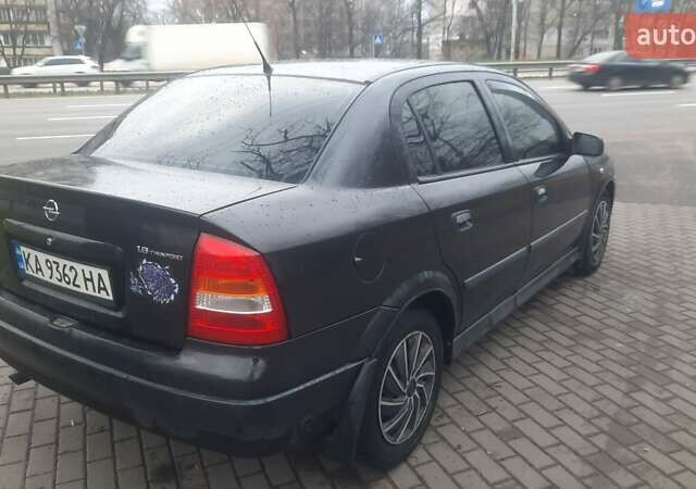 Черный Опель Астра, объемом двигателя 1.6 л и пробегом 277 тыс. км за 3400 $, фото 2 на Automoto.ua