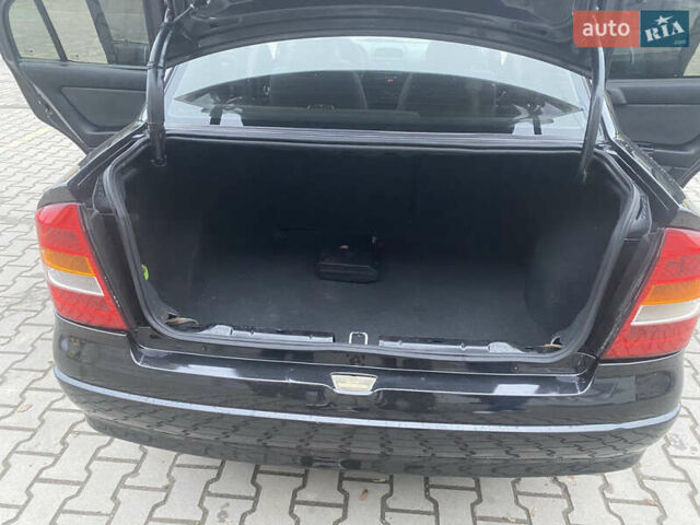 Черный Опель Астра, объемом двигателя 1.4 л и пробегом 229 тыс. км за 3200 $, фото 17 на Automoto.ua