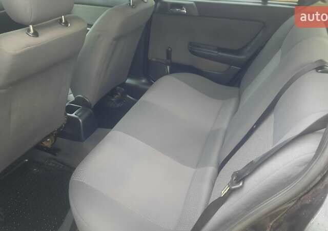 Черный Опель Астра, объемом двигателя 1.6 л и пробегом 277 тыс. км за 3400 $, фото 8 на Automoto.ua