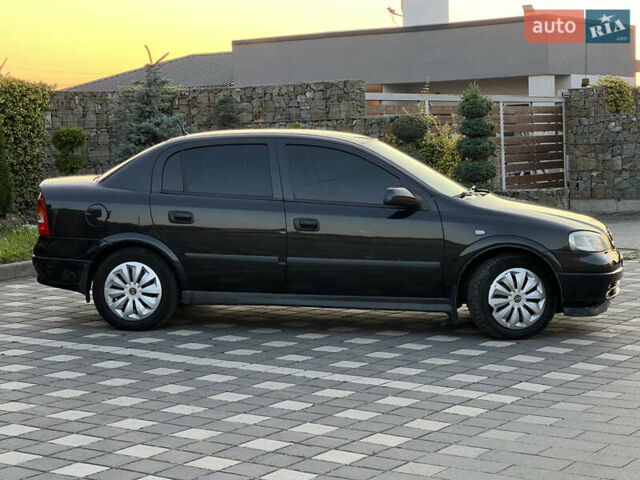 Чорний Опель Астра, об'ємом двигуна 1.6 л та пробігом 214 тис. км за 2999 $, фото 4 на Automoto.ua