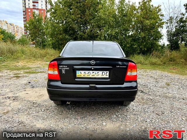 Черный Опель Астра, объемом двигателя 1.4 л и пробегом 176 тыс. км за 4390 $, фото 3 на Automoto.ua