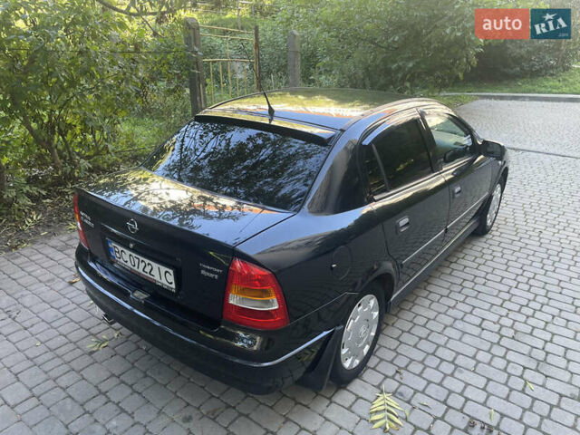 Черный Опель Астра, объемом двигателя 1.39 л и пробегом 159 тыс. км за 3700 $, фото 4 на Automoto.ua
