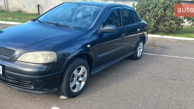 Чорний Опель Астра, об'ємом двигуна 1.36 л та пробігом 290 тис. км за 3900 $, фото 2 на Automoto.ua